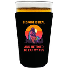 Load image into Gallery viewer, collapsible, neoprene 16oz. pint glass koozie with &quot;Bigfoot is Real..&quot; graphic printed on one side.
