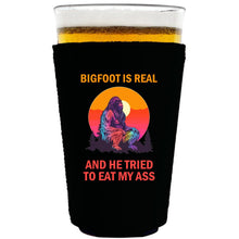 Load image into Gallery viewer, collapsible, neoprene 16oz. pint glass koozie with "Bigfoot is Real.." graphic printed on one side.