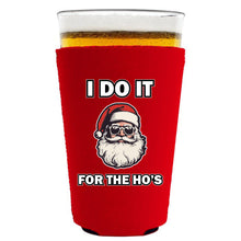 Load image into Gallery viewer, red pint glass koozie with i do it for the ho's text and santa graphic design