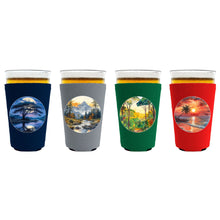 Load image into Gallery viewer, Landscape Outdoor Designs Pint Glass Coolie 4 Pack (1 each Tropical, Jungle, Savannah, Mountain)