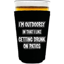 Load image into Gallery viewer, pint glass koozie with im outdoorsy design