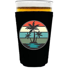 Load image into Gallery viewer, pint glass koozie with retro palm trees design