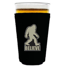 Load image into Gallery viewer, pint glass koozie with bigfoot believe design
