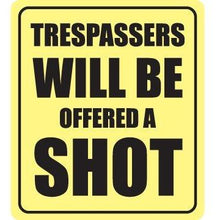Load image into Gallery viewer, vinyl sticker with trespassers will be offered a shot design