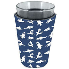 Load image into Gallery viewer, pint glass koozie with shark silhouettes in white on a navy background