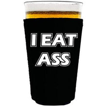 Load image into Gallery viewer, black pint glass koozie with "i eat ass" funny text design