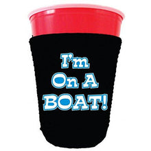 Load image into Gallery viewer, black party cup koozie with im on a boat design