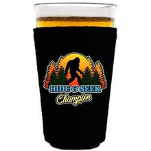 Load image into Gallery viewer, pint glass koozie with hide and seek champion design