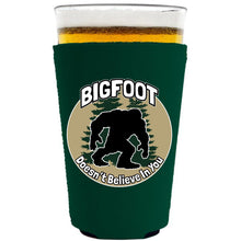 Load image into Gallery viewer, Bigfoot Doesn't Believe In You Pint Glass Coolie