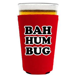 red pint glass koozie with bah hum bug text design