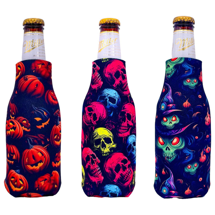 three beer bottle koozies with halloween pattern prints