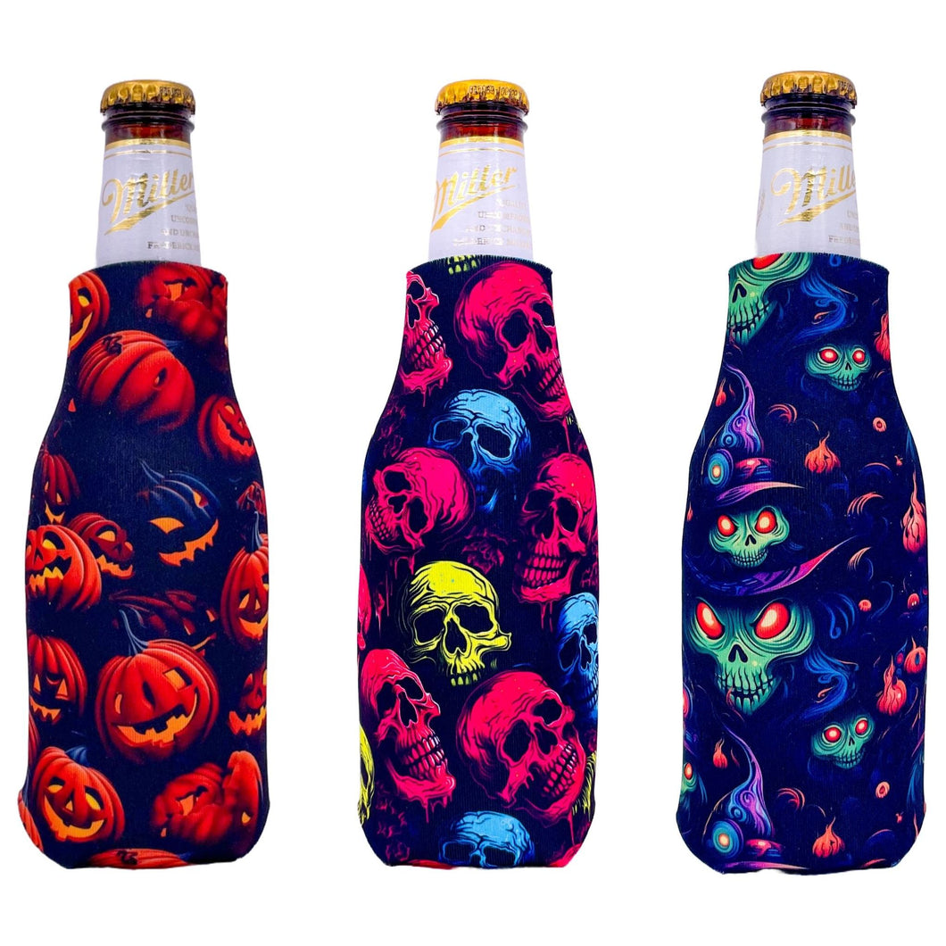 three beer bottle koozies with halloween pattern prints