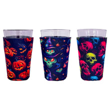 Load image into Gallery viewer, three pint glass koozies with halloween pattern prints
