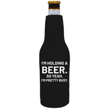Load image into Gallery viewer, 12oz. neoprene beer bottle  koozie with zipper closure on one side and &quot;I&#39;m Holding a Beer,,&quot; graphic printed on the opposite side.
