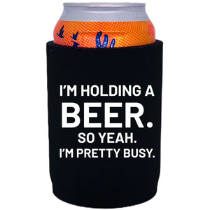 neoprene, full bottom 12oz. can koozie with "I'm holding a beer" graphic printed on one side.