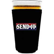 Load image into Gallery viewer, Black pint glass koozie with “send it” text with red white and blue background design
