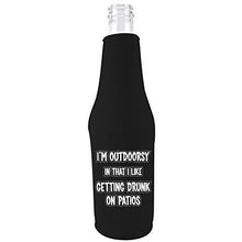 Load image into Gallery viewer, black beer bottle koozie with im outdoorsy in that i like getting drunk on patios design 
