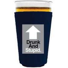 Load image into Gallery viewer, pint glass koozie with drunk and stupid design

