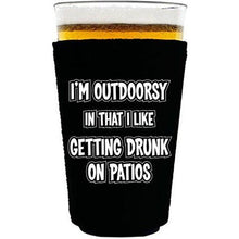 Load image into Gallery viewer, pint glass koozie with im outdoorsy design
