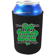 Load image into Gallery viewer, black can koozie with &quot;you can&#39;t drink all day if you don&#39;t start in the morning&quot; funny text and shamrock graphic design
