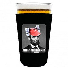 Load image into Gallery viewer, pint glass koozie with abraham drinking design
