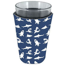 Load image into Gallery viewer, pint glass koozie with shark silhouettes in white on a navy background
