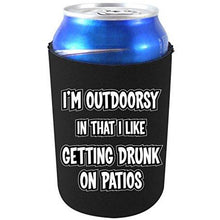 Load image into Gallery viewer, black can koozie with &quot;i&#39;m outdoorsy in that i like getting drunk on patios&quot; funny text design

