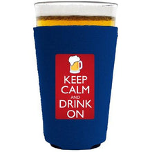 Load image into Gallery viewer, pint glass koozie with keep calm and drink on design
