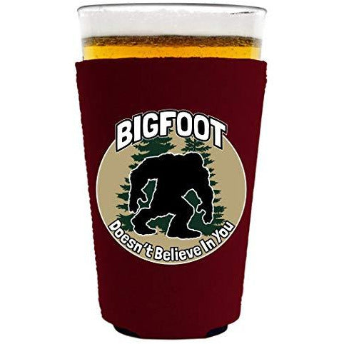 pint glass koozie with bigfoot doesnt believe in you design