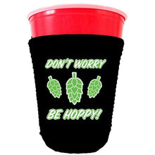 Load image into Gallery viewer, black party cup koozie with dont worry be hoppy design 
