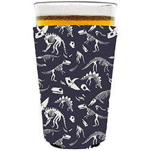 Load image into Gallery viewer, pint glass koozie with dinosaur bones design
